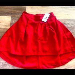 From Jori high low polyester skirt women’s size m-NWT